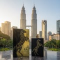 Lail Maleki Lattafa boxes marble table kuala lumpur cityscape skyline buildings palm trees