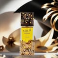 Atheeri Lattafa women yellow liquid gold decorative glass fragrance bottle closeup front