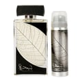 Najdia Lattafa men fragrance set sleek black silver bottles white background closeup