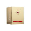 Emeer Lattafa gold packaging woody scent white background closeup side corner angled