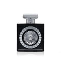 Wajood Lattafa eau de parfum, botol hitam perak, latar putih refleks cahaya