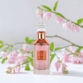 Velvet Rose Lattafa pink unisex fragrance elegant glass crystal cap packaging surrounded flowers