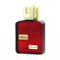 Red glass Lattafa ramz gold woman edp fragrance perfumes bottles closeup view front side profile