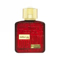 Red Lattafa Ramz Gold Woman edp perfume bottle closeup on white background side view