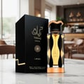 Teriaq Intense Lattafa eau de parfum bottle and box white marble table near large window